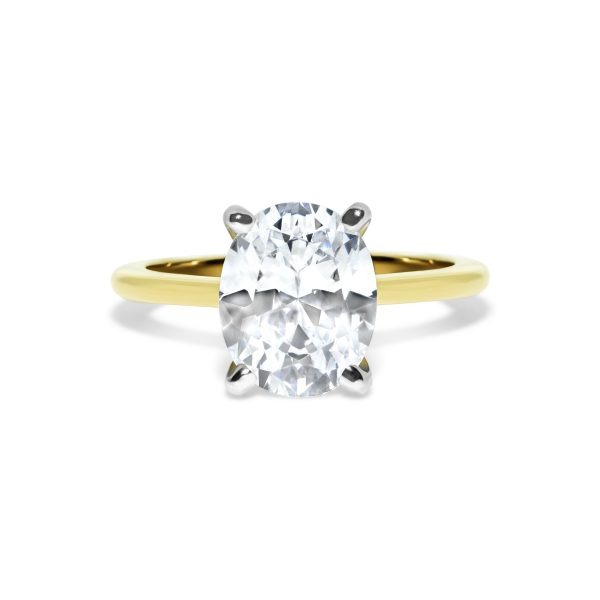 Two tone oval solitaire engagement ring